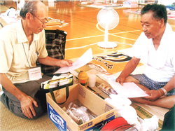 小林さんと山崎豊昭事務局長